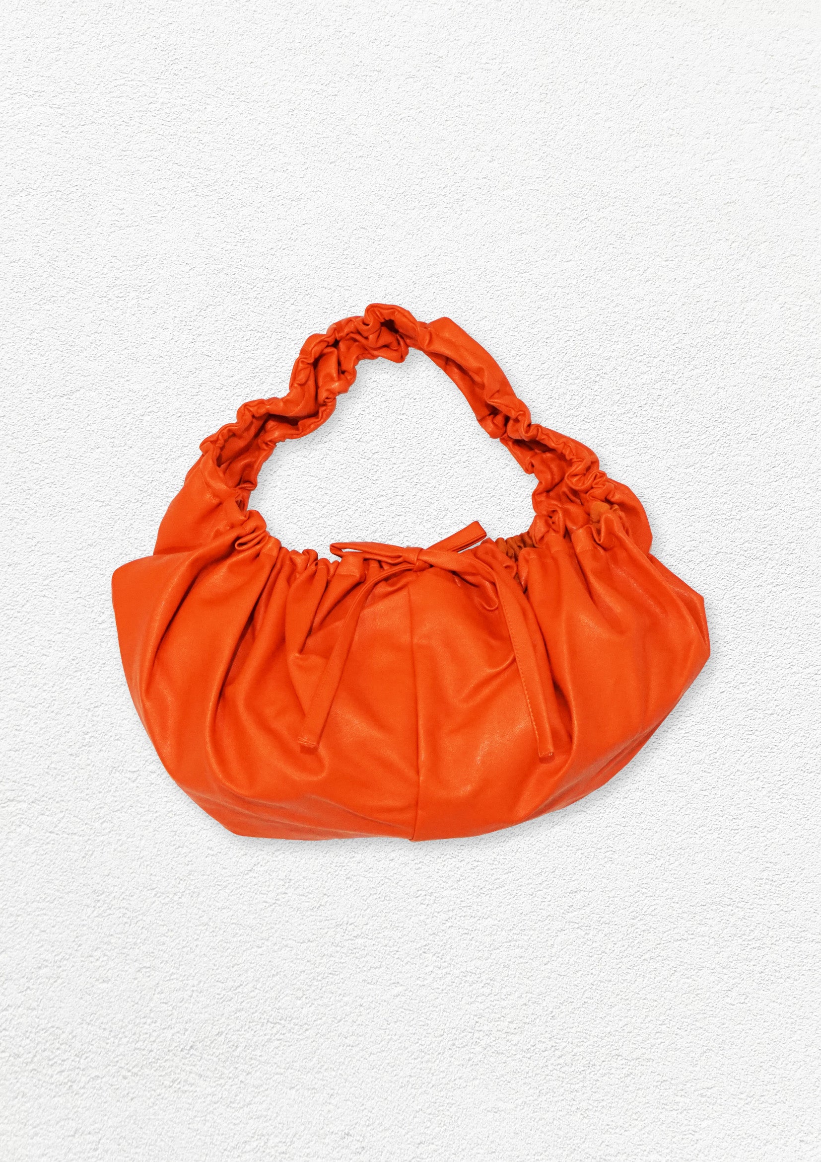 Vegan leather circular shoulder bag - orange