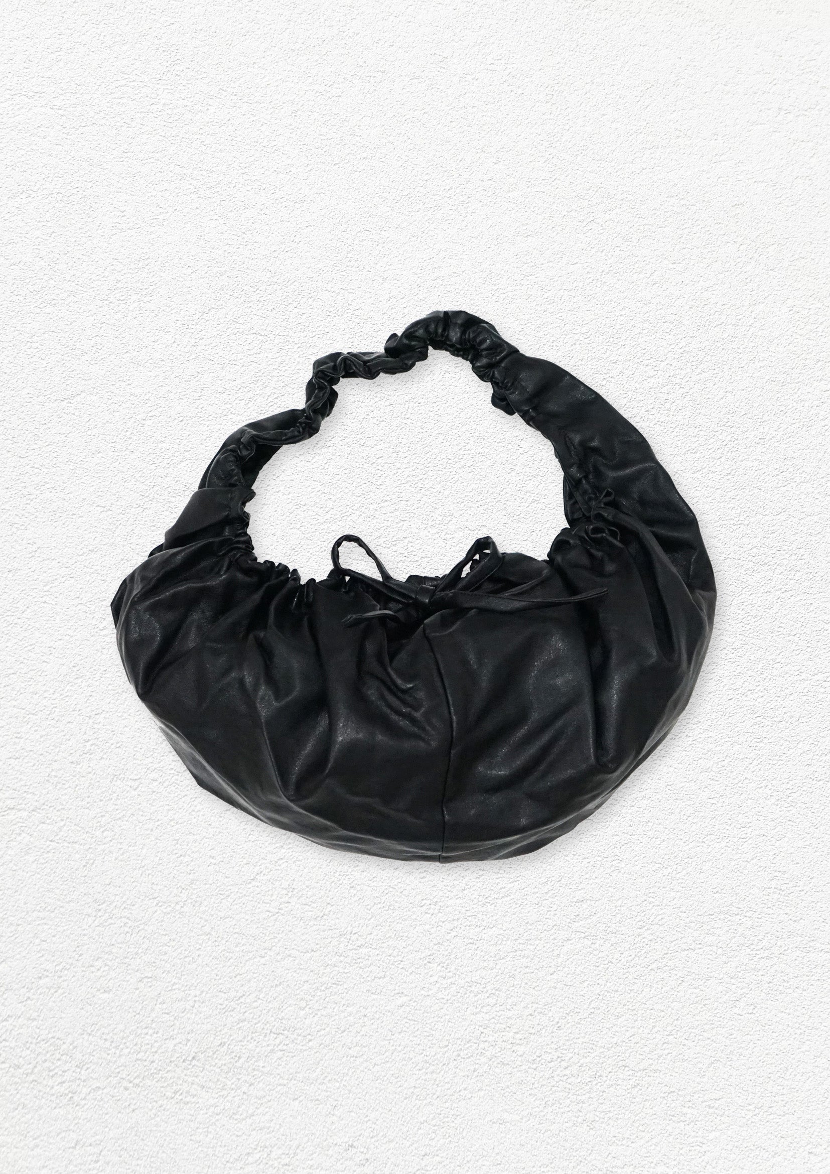Vegan leather circular shoulder bag - black
