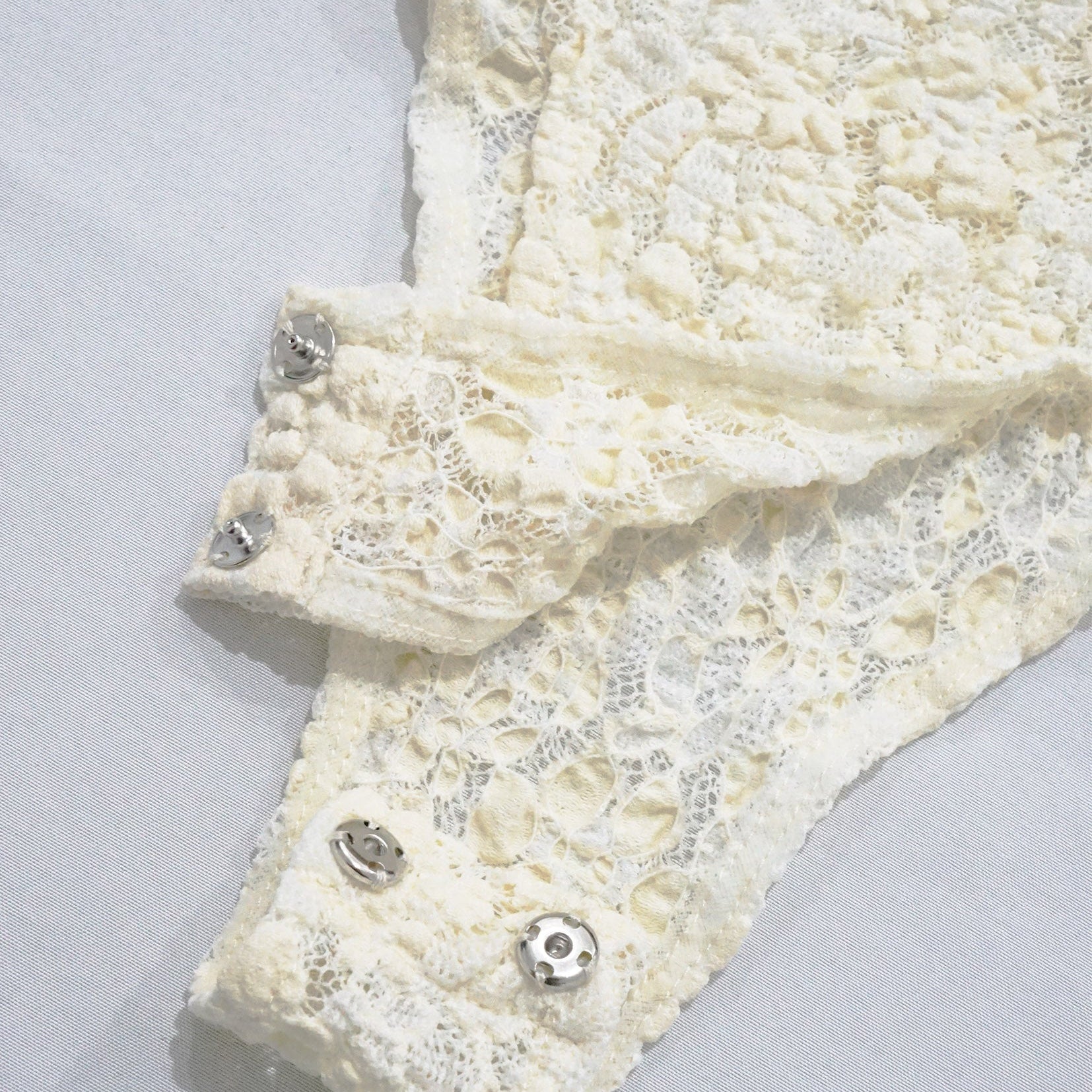 Floral lace see-through sling bodysuit in cream