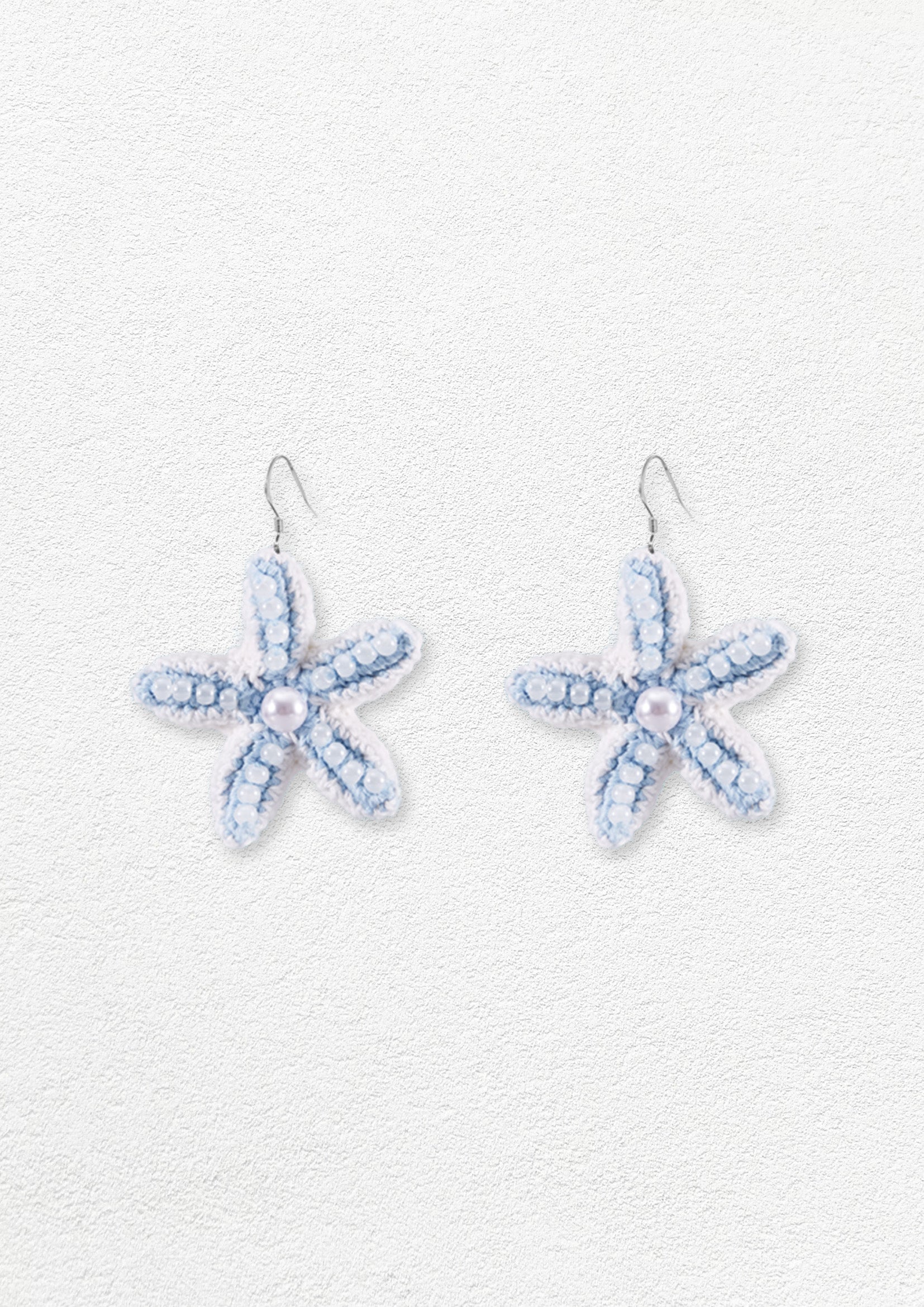 Sea star crochet earrings - baby blue