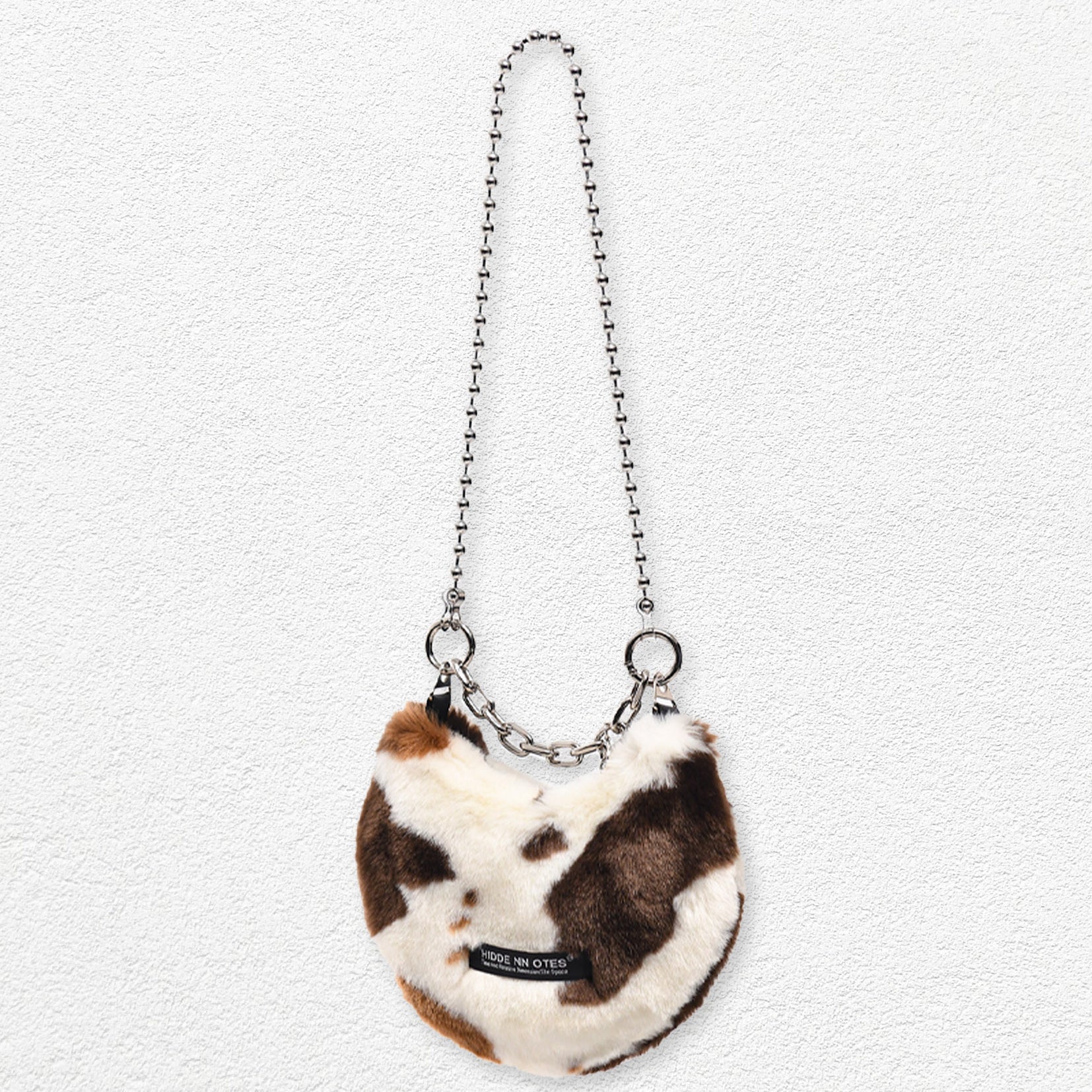 Fluffy shoulder/hand moon bag - cow