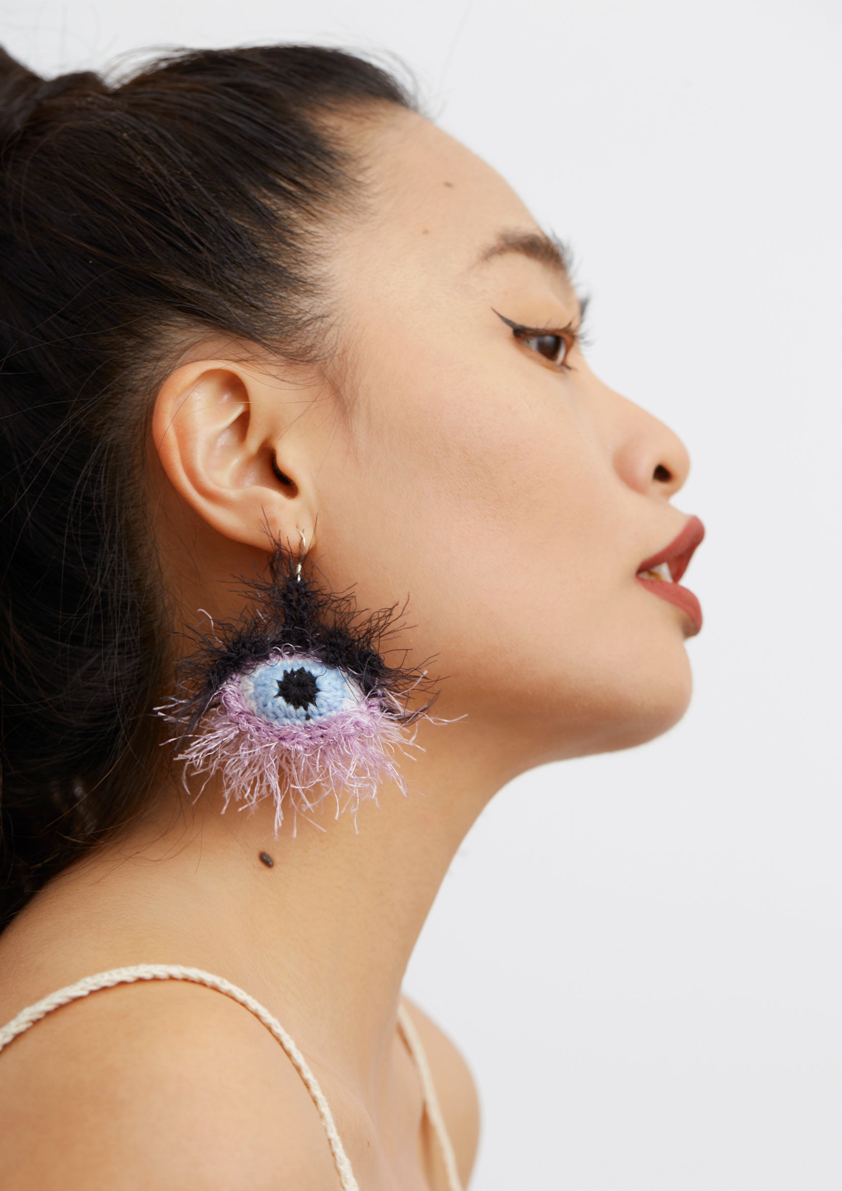 Fluffy eyes crochet earrings - purple