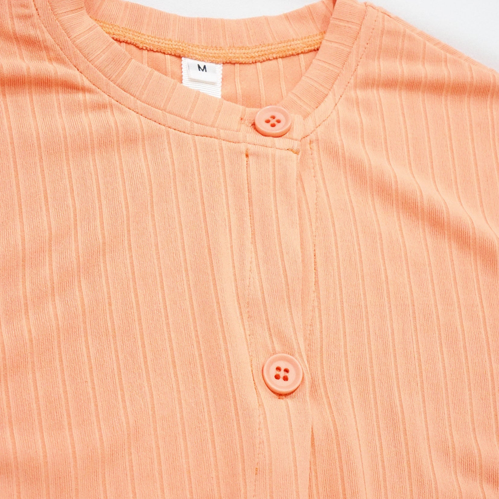 Detachable sleeve slim-fit crop cardigan in peach