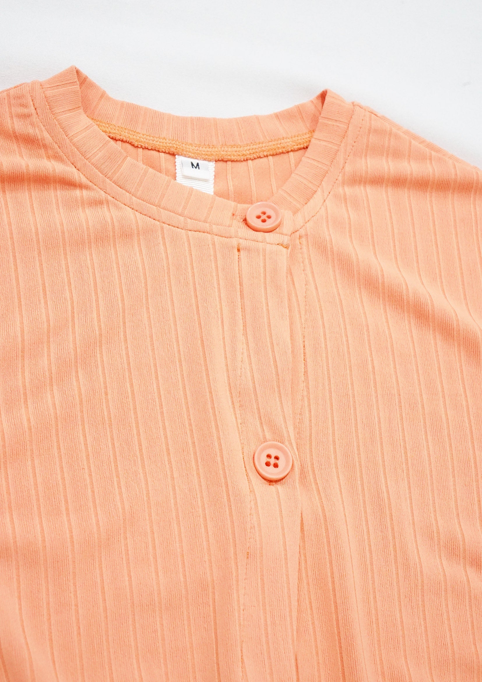 Detachable sleeve slim-fit crop cardigan in peach