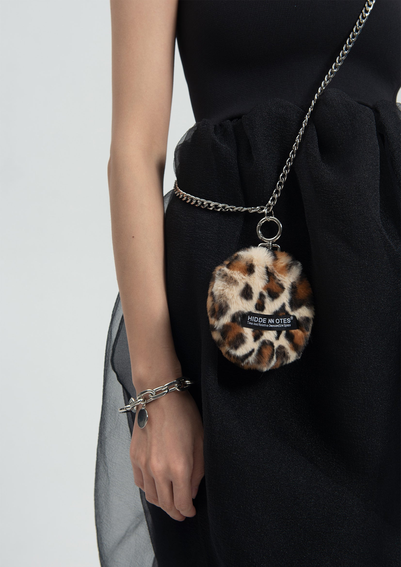 Faux fur crossbody mini round bag - leopard
