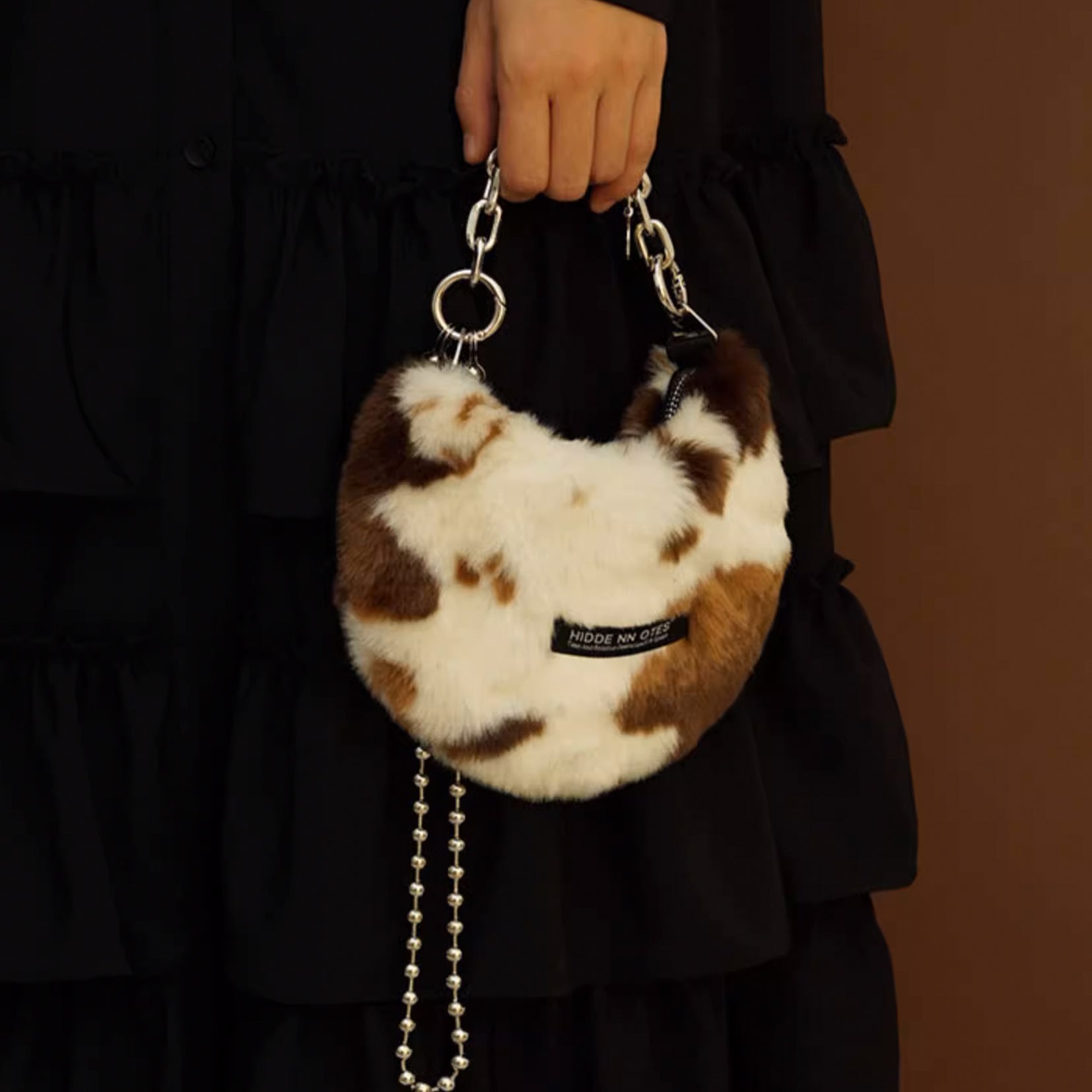 Fluffy shoulder/hand moon bag - cow