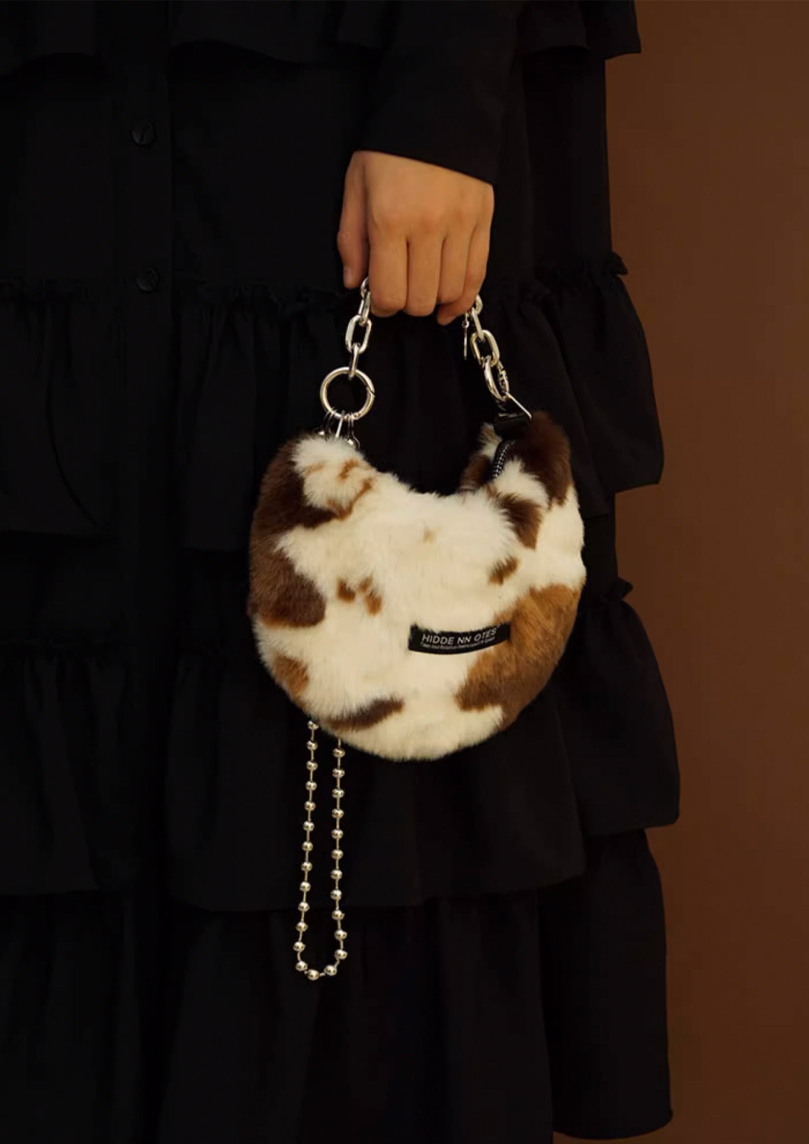 Fluffy shoulder/hand moon bag - cow