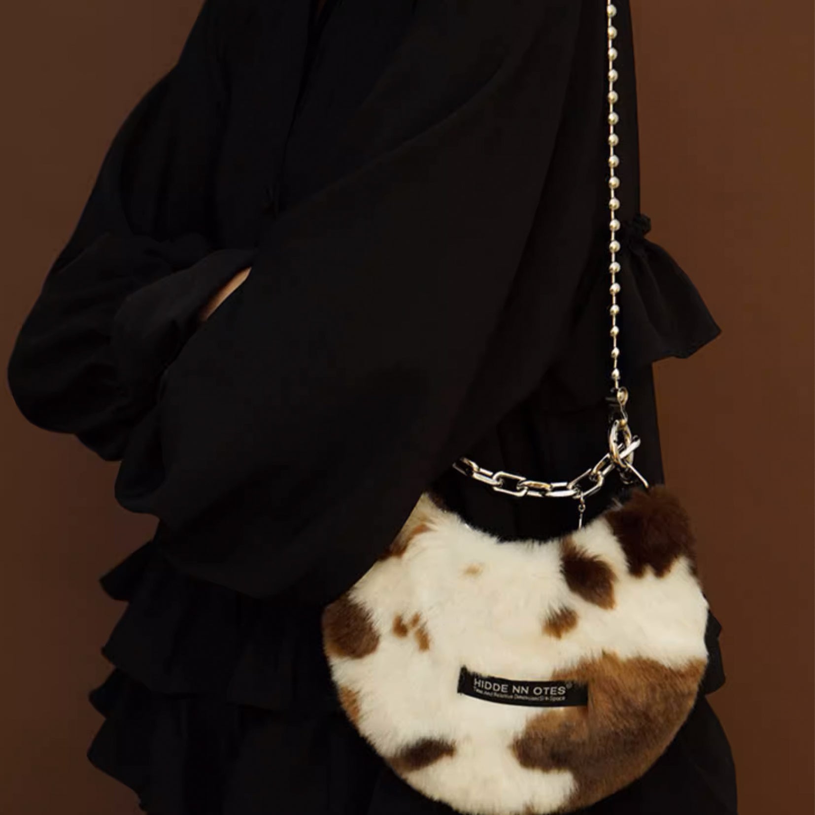 Fluffy shoulder/hand moon bag - cow