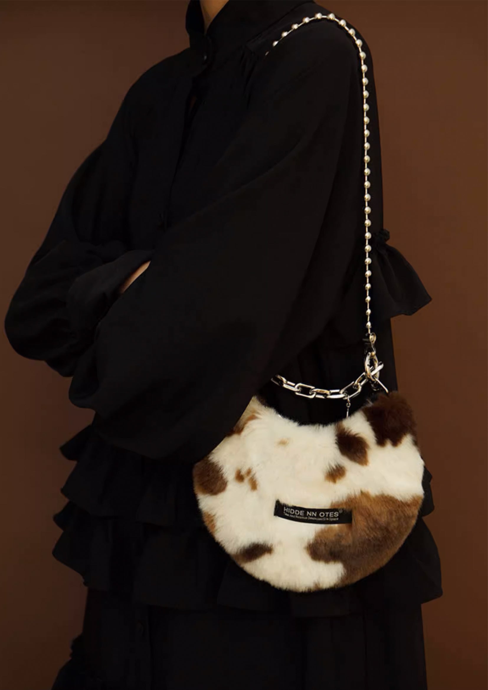 Fluffy shoulder/hand moon bag - cow