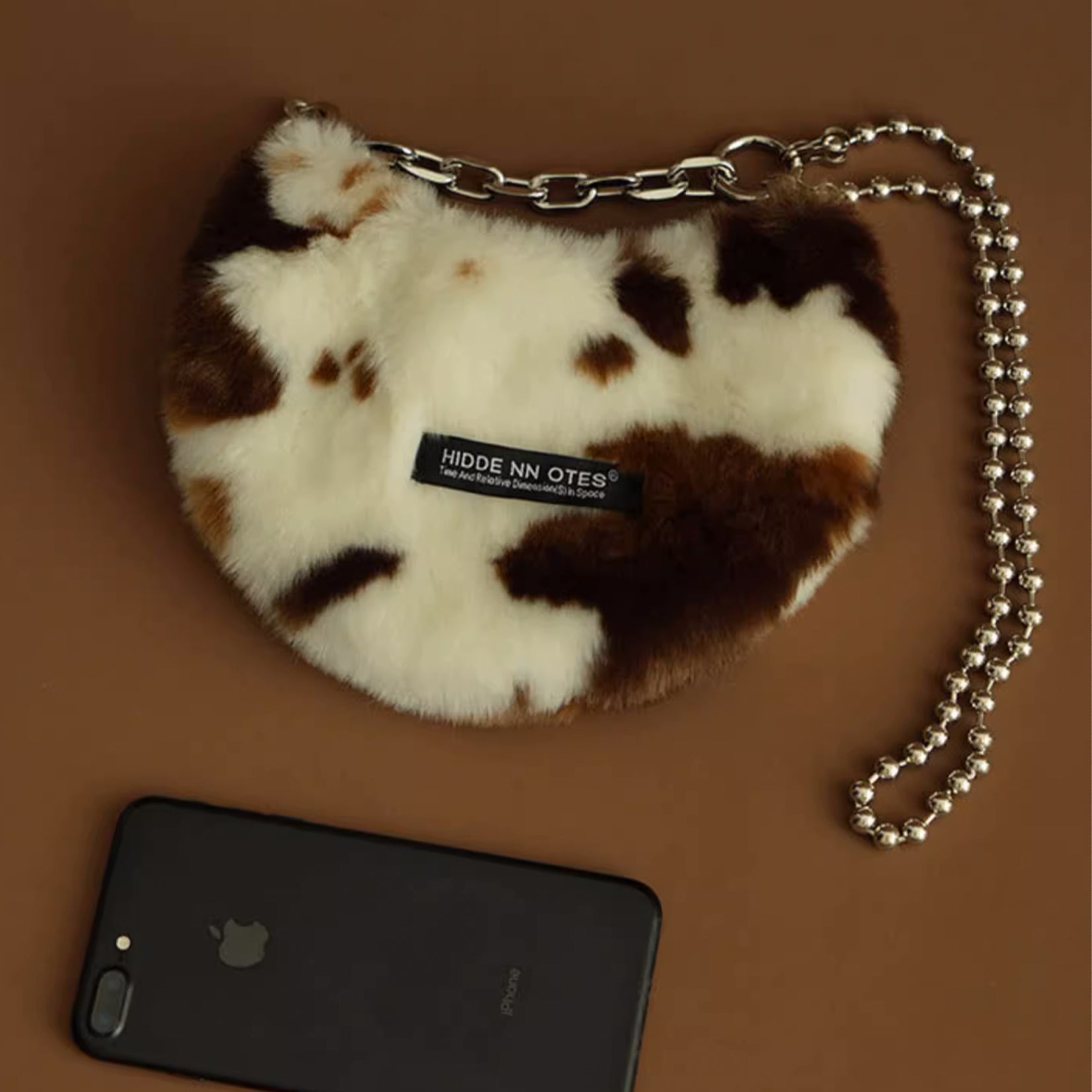 Fluffy shoulder/hand moon bag - cow