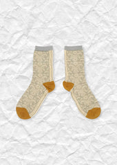 Tendril jacquard mid-calf sock in cream