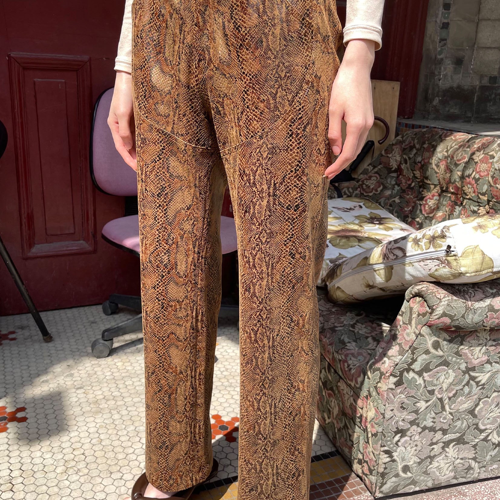 Snakeskin print straight pants in golden brown