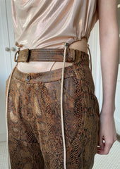 Snakeskin print straight pants in golden brown