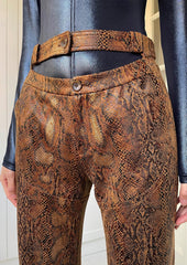 Snakeskin print straight pants in golden brown
