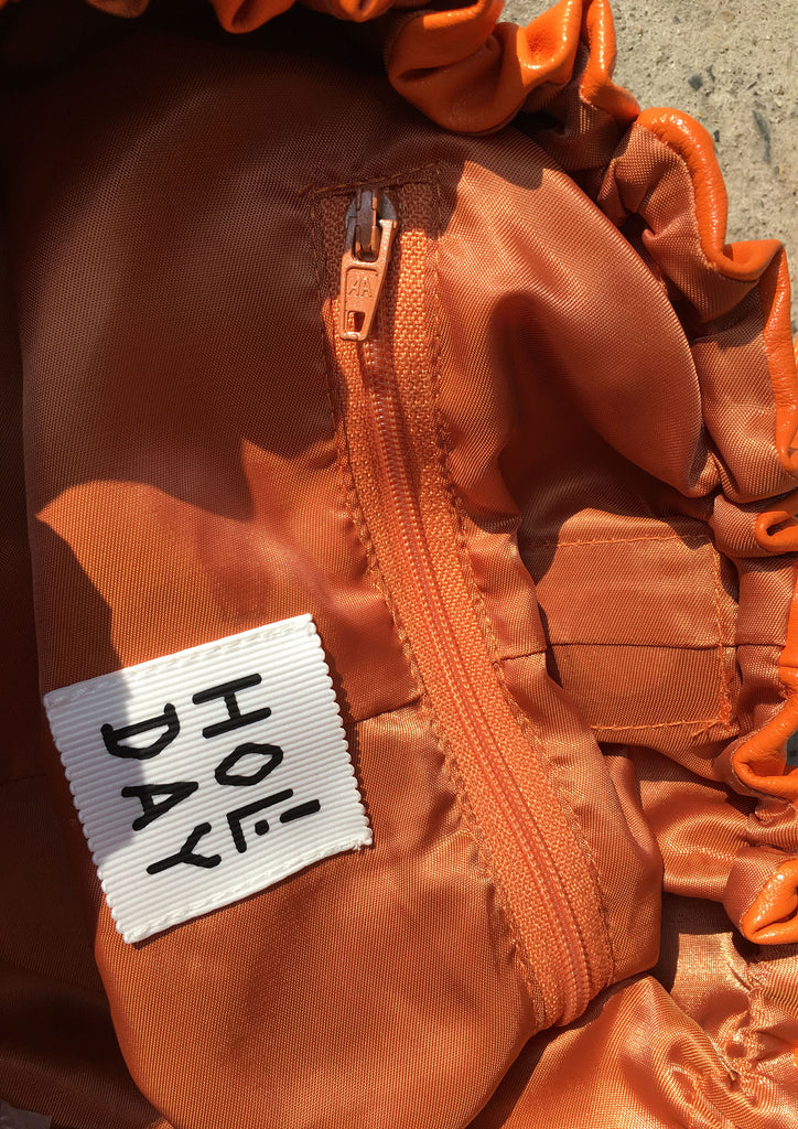 Circular shoulder bag pleated vegan leather - orange
